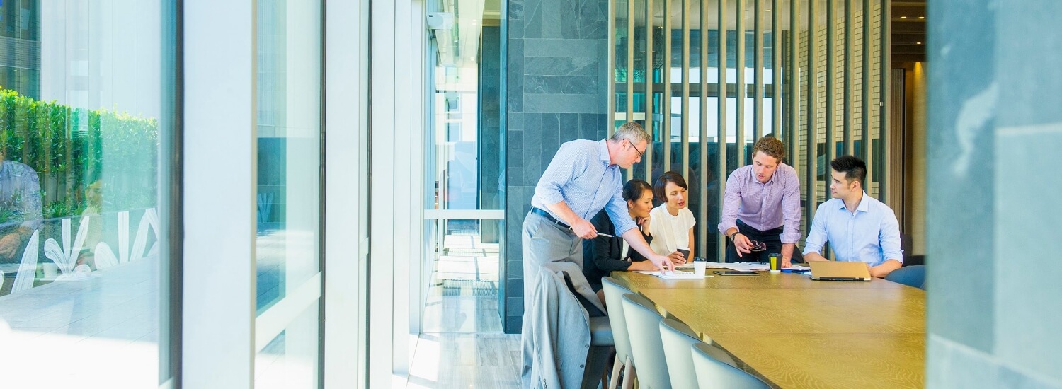 Businesspeople having meeting in modern office